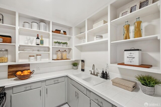 pantry with a sink