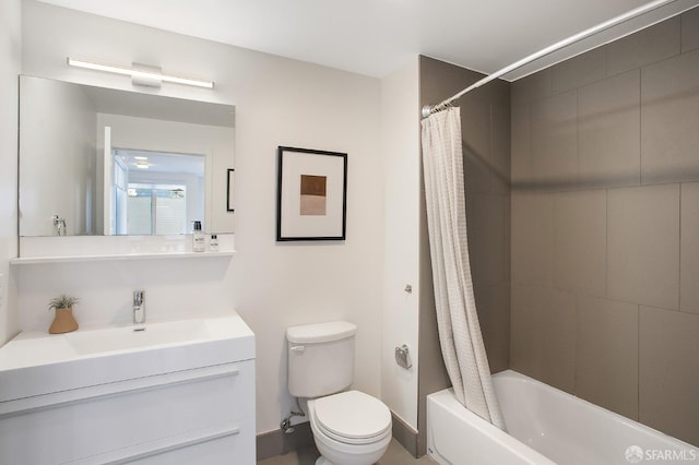 full bathroom featuring shower / tub combo, vanity, and toilet