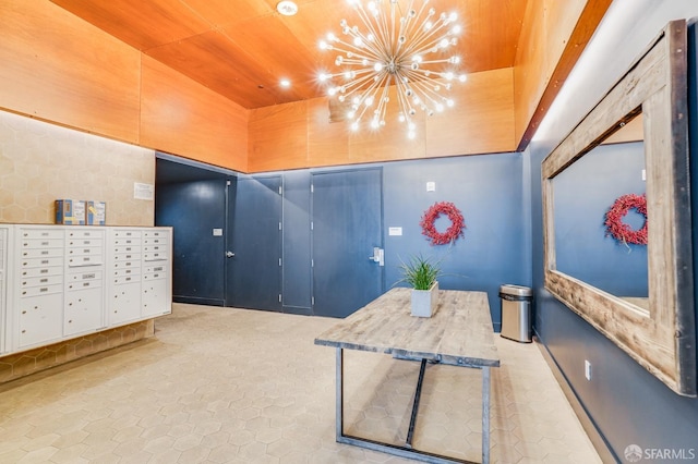 interior space featuring a chandelier and mail boxes