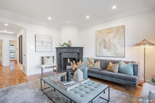 living room featuring parquet floors