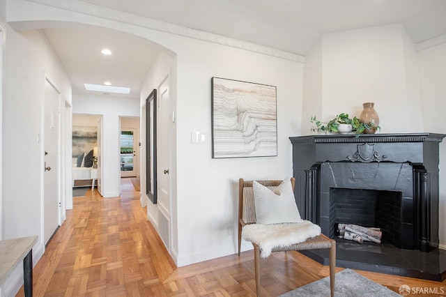 hall with light parquet floors