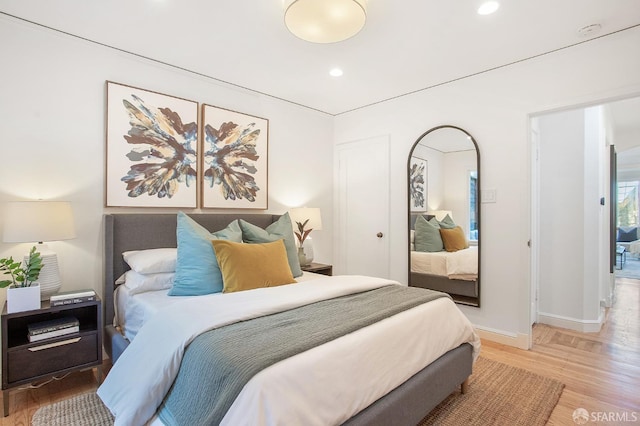 bedroom with wood-type flooring