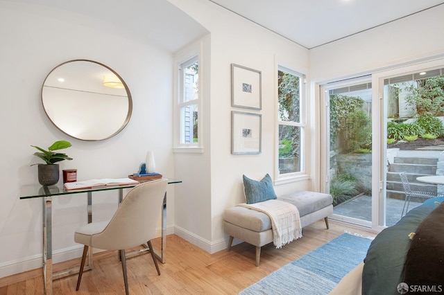 sitting room with light hardwood / wood-style flooring