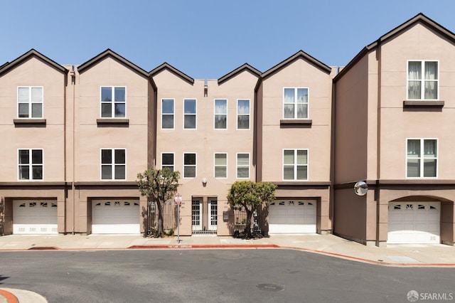 163 Stoneridge Ln, San Francisco, CA 94134 - multi unit property featuring stucco siding and an attached garage