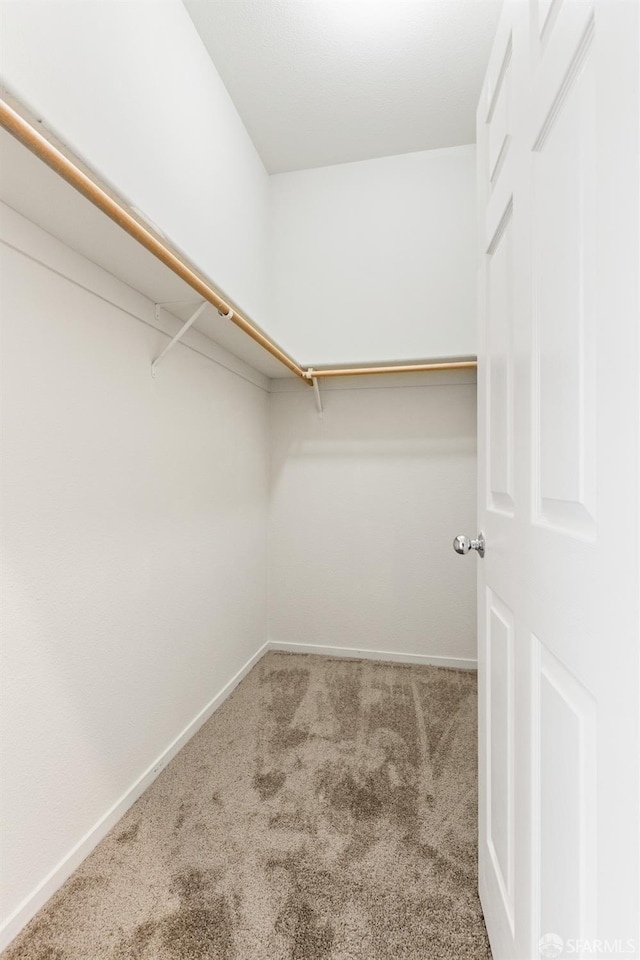 163 Stoneridge Ln, San Francisco, CA 94134 - walk in closet with carpet flooring