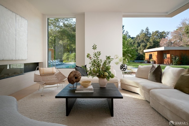 living room with floor to ceiling windows