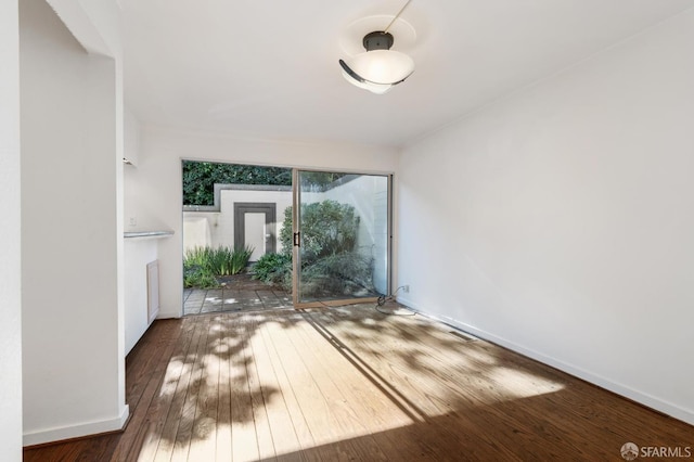 foyer entrance with hardwood / wood-style floors