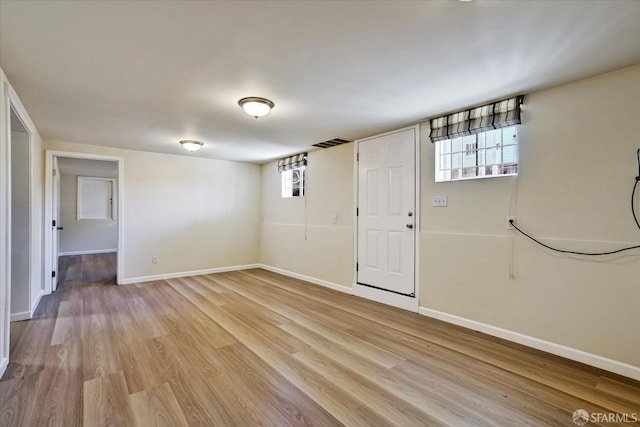 2486 26th Ave, Oakland, CA 94601 - entryway with light wood-style flooring and baseboards