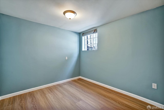 2486 26th Ave, Oakland, CA 94601 - empty room with wood finished floors and baseboards