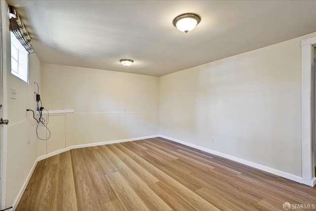 2486 26th Ave, Oakland, CA 94601 - spare room with light wood-style floors and baseboards