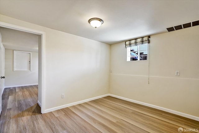 2486 26th Ave, Oakland, CA 94601 - unfurnished room featuring baseboards and light wood-style floors