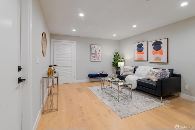 living room with light hardwood / wood-style floors