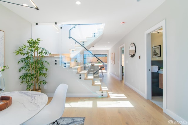 dining area with light wood-type flooring