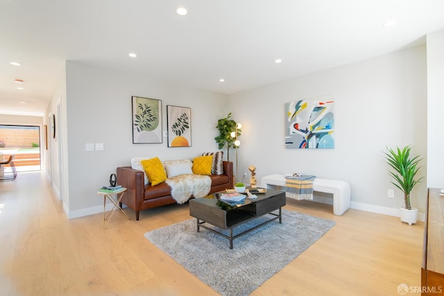 living room with light hardwood / wood-style floors