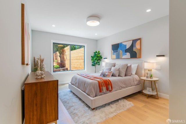 bedroom featuring light hardwood / wood-style floors