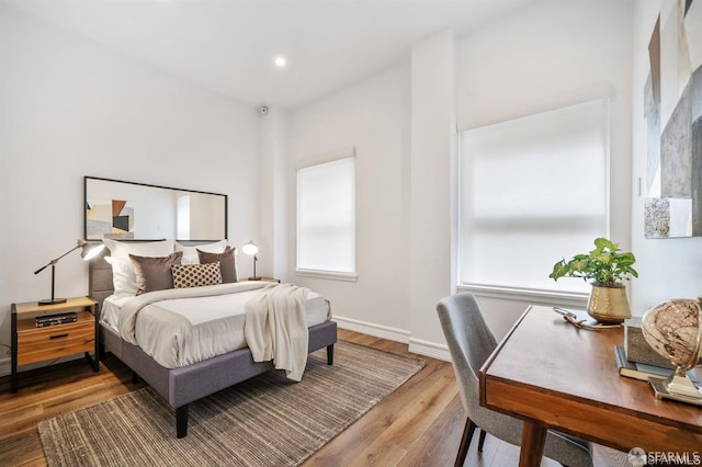 850 Powell St Unit 104, San Francisco, CA 94108 - bedroom with wood finished floors, recessed lighting, and baseboards