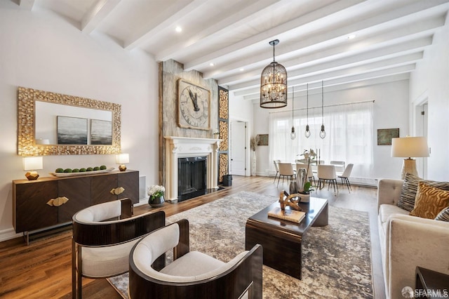 850 Powell St Unit 104, San Francisco, CA 94108 - living area featuring a chandelier, wood finished floors, beamed ceiling, a fireplace, and recessed lighting
