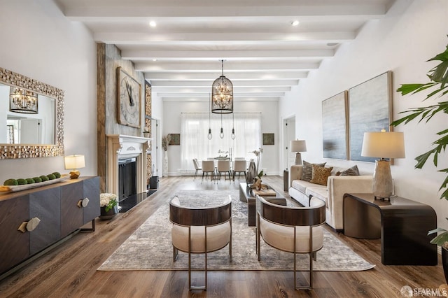 850 Powell St Unit 104, San Francisco, CA 94108 - living room with a chandelier, beam ceiling, wood finished floors, and a fireplace
