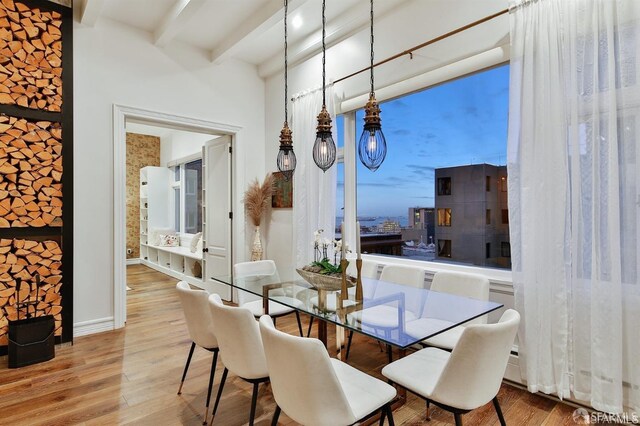 850 Powell St Unit 104, San Francisco, CA 94108 - dining area with beam ceiling and wood finished floors