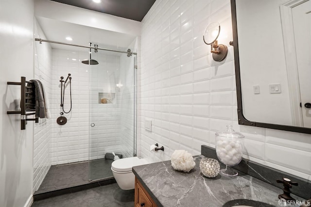 850 Powell St Unit 104, San Francisco, CA 94108 - bathroom featuring a shower stall, vanity, tile walls, toilet, and tile patterned flooring