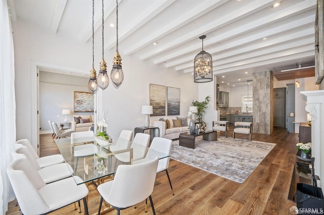 850 Powell St Unit 104, San Francisco, CA 94108 - dining room with a chandelier, dark wood-type flooring, beam ceiling, and recessed lighting