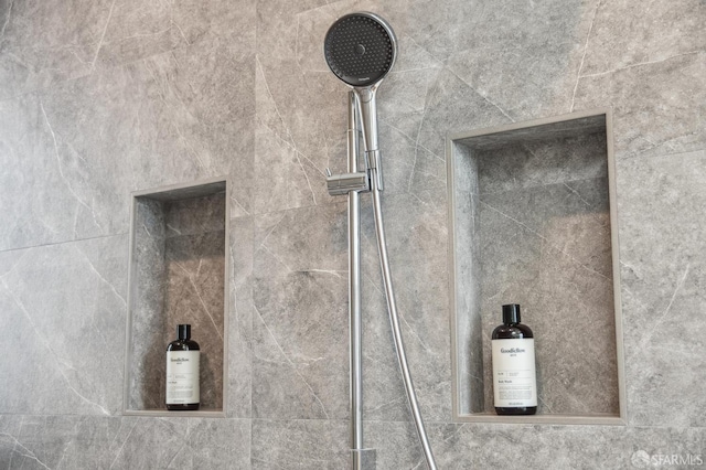 bathroom view of tiled shower