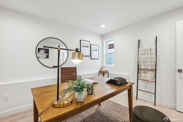 office featuring baseboards, recessed lighting, and light wood-type flooring