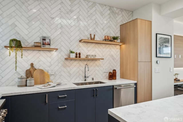 kitchen featuring a sink, open shelves, tasteful backsplash, dishwasher, and blue cabinetry
