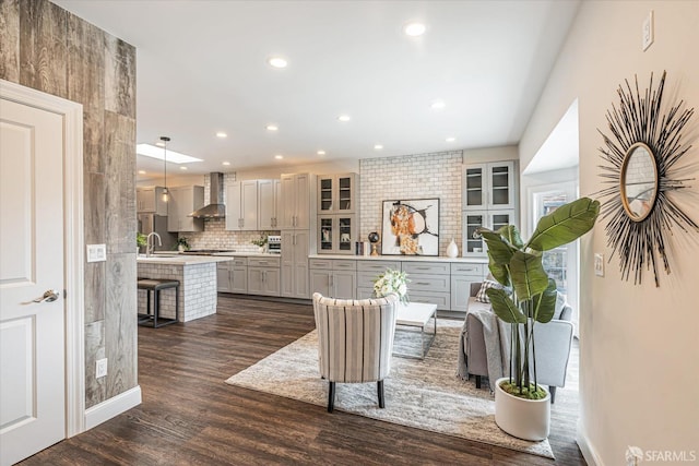 interior space featuring sink and dark hardwood / wood-style flooring