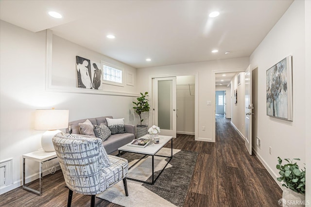 living room featuring dark hardwood / wood-style flooring