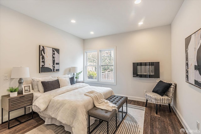 bedroom with hardwood / wood-style flooring