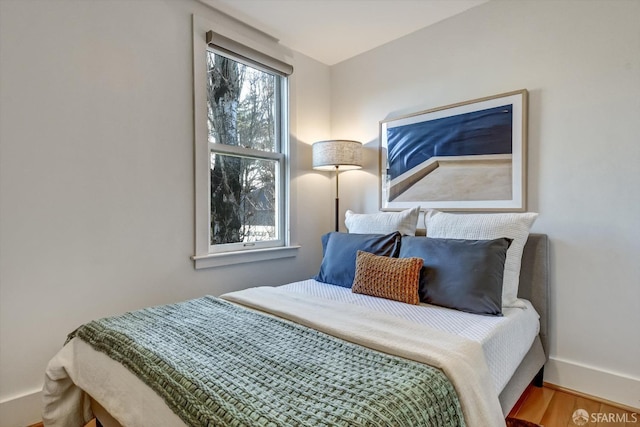 bedroom featuring wood-type flooring