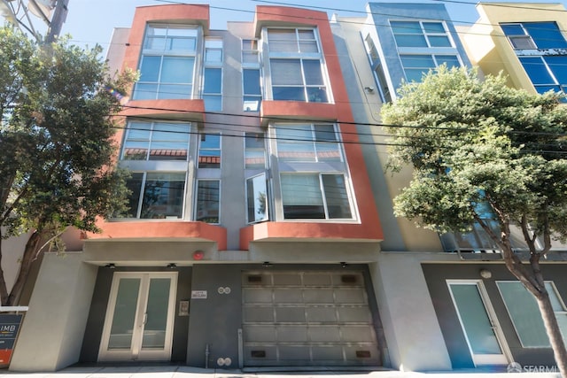 view of building exterior with an attached garage