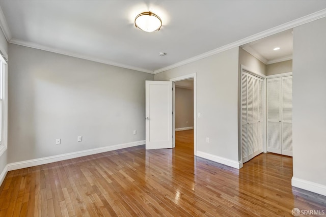1258 York St, San Francisco, CA 94110 - unfurnished bedroom featuring wood finished floors and ornamental molding