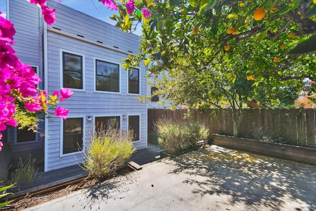 1258 York St, San Francisco, CA 94110 - view of front facade featuring a patio area