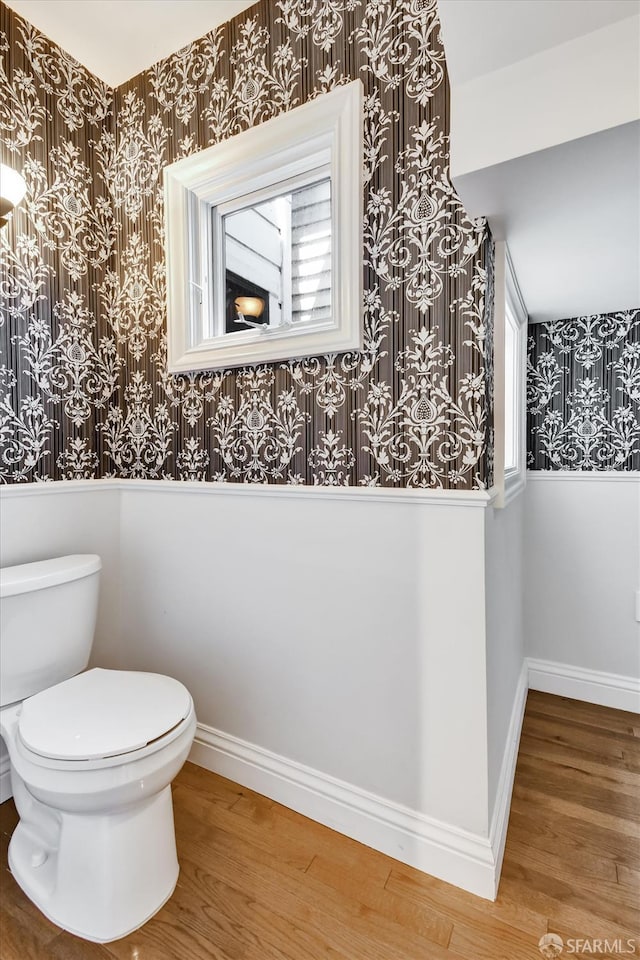 1258 York St, San Francisco, CA 94110 - bathroom with wallpapered walls, wood finished floors, and a wainscoted wall