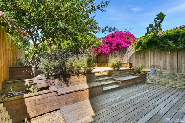 1258 York St, San Francisco, CA 94110 - wooden terrace featuring a fenced backyard