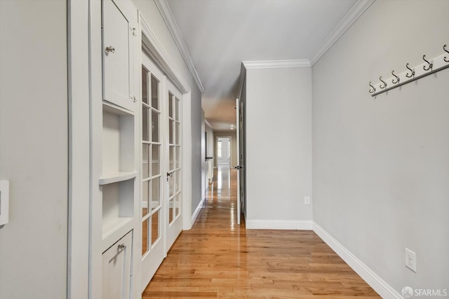 1258 York St, San Francisco, CA 94110 - corridor with crown molding, light wood-style flooring, and french doors