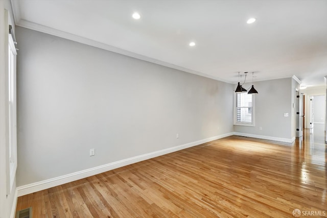 1258 York St, San Francisco, CA 94110 - empty room with ornamental molding, light wood-style floors, and recessed lighting