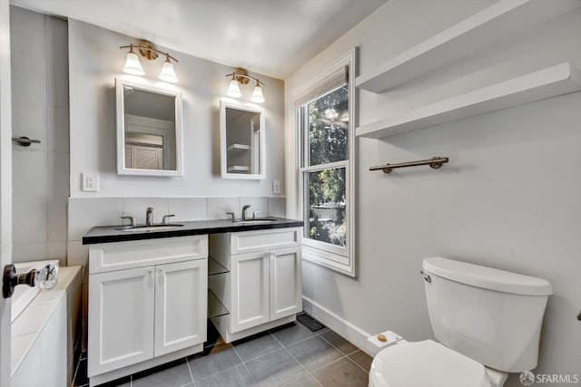 1258 York St, San Francisco, CA 94110 - bathroom featuring vanity, tile patterned floors, and a bath