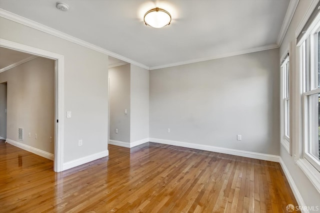 1258 York St, San Francisco, CA 94110 - empty room featuring a smoke detector, light wood finished floors, and ornamental molding