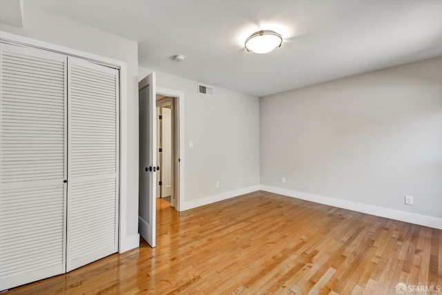 1258 York St, San Francisco, CA 94110 - unfurnished bedroom featuring a closet and light wood-style flooring