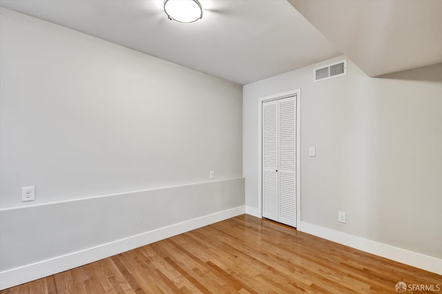 1258 York St, San Francisco, CA 94110 - unfurnished bedroom with a closet and light wood-style flooring
