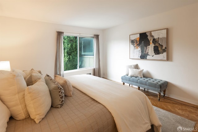bedroom featuring baseboards
