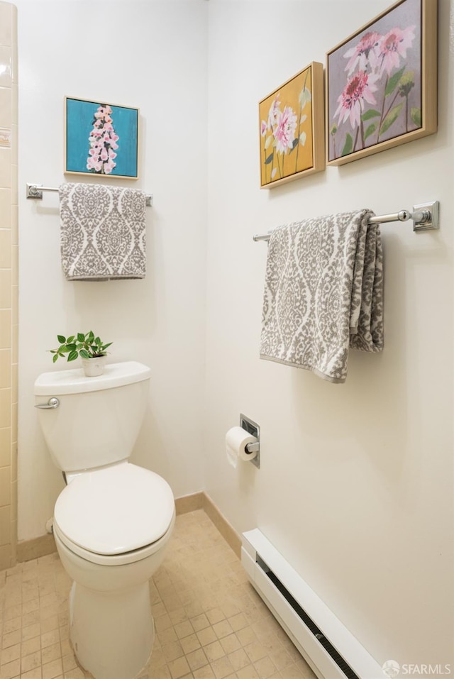 full bath featuring baseboard heating, baseboards, and toilet