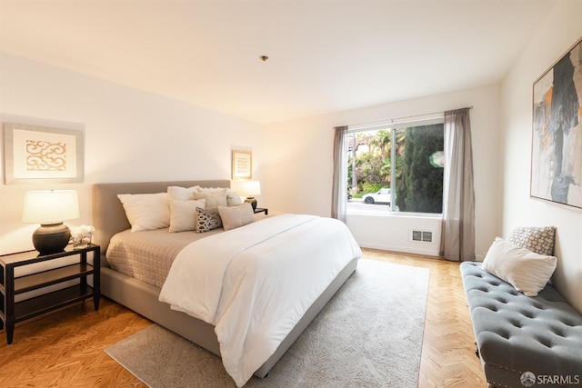 bedroom featuring visible vents