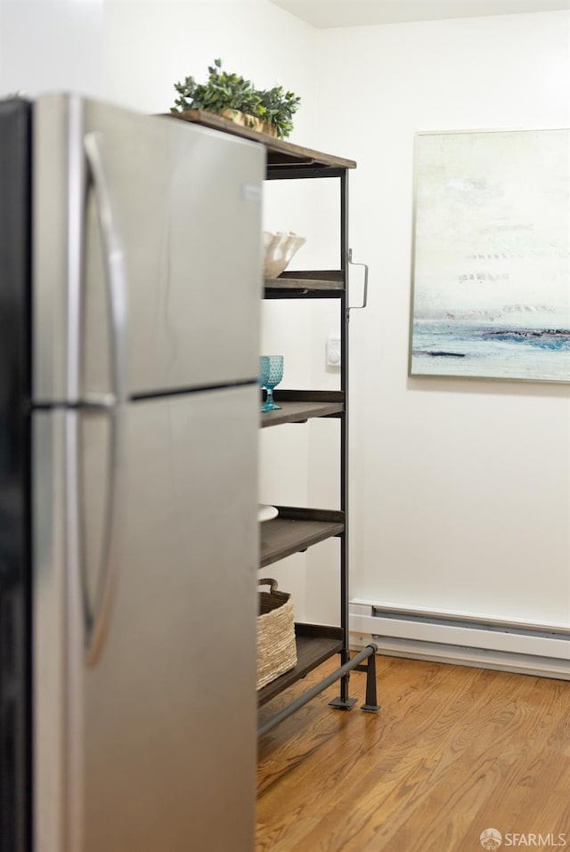 storage area with baseboard heating