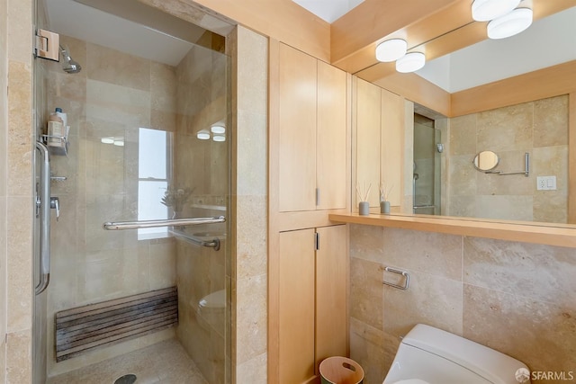 2201 Sacramento St Unit 404, San Francisco, CA 94115 - full bathroom featuring tile walls, toilet, and a shower stall