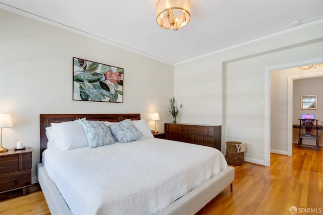 2201 Sacramento St Unit 404, San Francisco, CA 94115 - bedroom with baseboards, ornamental molding, and light wood finished floors