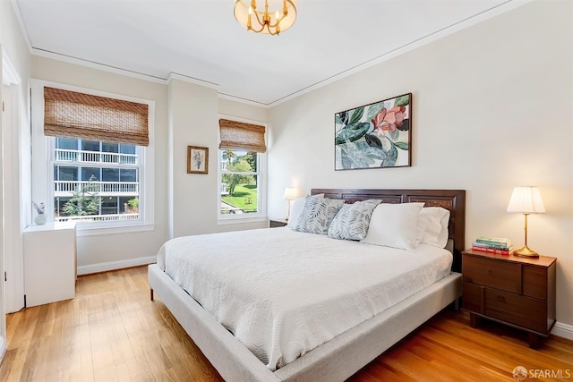 2201 Sacramento St Unit 404, San Francisco, CA 94115 - bedroom with baseboards, ornamental molding, and wood finished floors